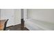 Neutral bedroom showing dark wood floors and white furniture at 1954 Treebark Dr, Charleston, SC 29414