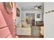 Inviting living room with hardwood floors, comfortable seating, and an open layout to the dining area at 1954 Treebark Dr, Charleston, SC 29414