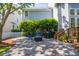 Relaxing backyard with a patio, beautiful landscaping, and privacy fence at 1977 Pierce St, Charleston, SC 29492