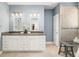 A stylish bathroom with double sinks, modern fixtures, and a tiled walk-in shower at 1977 Pierce St, Charleston, SC 29492