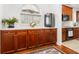 Butler's pantry featuring custom cabinetry, ample counter space, and modern appliances at 1977 Pierce St, Charleston, SC 29492