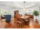 Bright dining room featuring hardwood floors, modern lighting, and a spacious layout for entertaining at 1977 Pierce St, Charleston, SC 29492