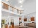 Spacious living room with hardwood floors, high ceilings, and abundant natural light at 1977 Pierce St, Charleston, SC 29492