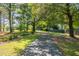 Scenic walking path surrounded by lush greenery and mature trees at 1977 Pierce St, Charleston, SC 29492