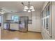 Bright kitchen with a dining nook, stainless refrigerator and plentiful storage at 2042 Dogwood Rd, Charleston, SC 29414