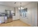 Bright kitchen with a dining nook, stainless refrigerator and plentiful storage at 2042 Dogwood Rd, Charleston, SC 29414