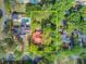 Aerial view of the property showcasing a spacious lot, pool, and outdoor amenities in a desirable neighborhood at 210 S Gum St, Summerville, SC 29483