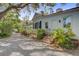 Charming home exterior with lovely landscaping, an inviting entrance, and a spacious yard at 210 S Gum St, Summerville, SC 29483
