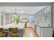 Open kitchen with an island and modern stainless steel appliances and finishes at 210 S Gum St, Summerville, SC 29483