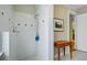 Bright shower room featuring tiled walls with black accents and an adjacent dark wood table at 210 S Gum St, Summerville, SC 29483