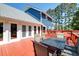 Outdoor deck space, perfect for entertaining with dining table and chairs at 2102 Williams Rd, Ruffin, SC 29475