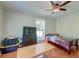 Bedroom with hardwood floors, ceiling fan, and natural light at 2102 Williams Rd, Ruffin, SC 29475