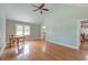 Bedroom featuring hardwood floors, vaulted ceiling, and direct access to bathroom at 2102 Williams Rd, Ruffin, SC 29475