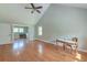 Bright bedroom boasting hardwood floors, vaulted ceiling, and desk by the window at 2102 Williams Rd, Ruffin, SC 29475