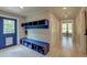 Functional entryway with custom storage and a convenient bench at 2102 Williams Rd, Ruffin, SC 29475