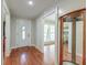 Home entryway with hardwood floors, featuring a view into the living room at 2102 Williams Rd, Ruffin, SC 29475