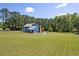 Large two story home on expansive lot with pastures, white fencing, and mature trees at 2102 Williams Rd, Ruffin, SC 29475