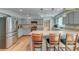 Spacious kitchen features stainless steel appliances, custom cabinets, and tile countertops at 2102 Williams Rd, Ruffin, SC 29475