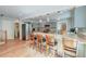 Open kitchen with breakfast bar seating, stainless appliances and custom cabinets at 2102 Williams Rd, Ruffin, SC 29475