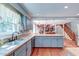Bright kitchen with stainless appliances, light colored cabinets, and hardwood flooring at 2102 Williams Rd, Ruffin, SC 29475