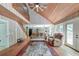 Open concept living room with hardwood floors, vaulted ceilings, and natural light at 2102 Williams Rd, Ruffin, SC 29475