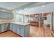 Open floor plan to the living room with hardwood floors and natural light at 2102 Williams Rd, Ruffin, SC 29475