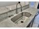 Marble countertops with stainless steel faucet in modern kitchen at 2159 Spoleto Ln # E, North Charleston, SC 29406
