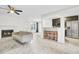 Open-concept living space features a fireplace, bar seating, and modern stainless steel appliances at 2159 Spoleto Ln # E, North Charleston, SC 29406