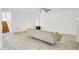 Open living room with stairs, white walls, and tile floors at 2159 Spoleto Ln # E, North Charleston, SC 29406