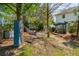 Inviting backyard featuring a hammock, seating area, and lush greenery at 2290 Deer Sight Way, Mount Pleasant, SC 29466