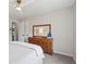 Bedroom features a large dresser, mirror, and ensuite bathroom access at 2290 Deer Sight Way, Mount Pleasant, SC 29466