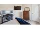 Spacious bedroom featuring modern desk, large monitor, and wooden furniture at 2290 Deer Sight Way, Mount Pleasant, SC 29466