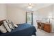 Cozy bedroom with a stylish work desk and lots of light from window at 2290 Deer Sight Way, Mount Pleasant, SC 29466