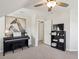 Bonus room offers a flexible space with a piano and shelving unit at 2290 Deer Sight Way, Mount Pleasant, SC 29466
