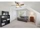 Bonus room with sofa, shelving, and natural light from the windows at 2290 Deer Sight Way, Mount Pleasant, SC 29466