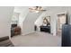 Versatile bonus room with desk, piano, and sloped ceilings at 2290 Deer Sight Way, Mount Pleasant, SC 29466