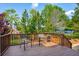 Inviting wood deck with seating, railing, and potted plants, perfect for outdoor relaxation at 2290 Deer Sight Way, Mount Pleasant, SC 29466