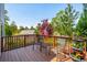 Spacious deck with outdoor seating, potted plants, and an American flag flying proudly at 2290 Deer Sight Way, Mount Pleasant, SC 29466
