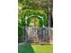 Charming garden gate and arbor covered in vines at 2290 Deer Sight Way, Mount Pleasant, SC 29466