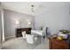 Bright office space featuring a modern white desk, stylish chairs, and a ceiling fan, ideal for remote work at 2290 Deer Sight Way, Mount Pleasant, SC 29466