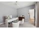 Home office features a modern desk, stylish seating, and a decorative plant, creating a productive workspace at 2290 Deer Sight Way, Mount Pleasant, SC 29466