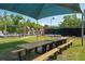 A shaded picnic area looks out to playground and tennis courts at 2290 Deer Sight Way, Mount Pleasant, SC 29466