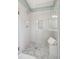 Modern shower with glass surround, stylish tile, and bench at 2290 Deer Sight Way, Mount Pleasant, SC 29466