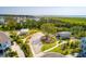 Aerial view of a picnic shelter, community green, beach volleyball and seating area, with surrounding natural beauty at 2292 Skyler Dr, Mount Pleasant, SC 29466