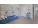 Cozy bedroom with unique playhouse bed frame and whimsical wall decor at 2292 Skyler Dr, Mount Pleasant, SC 29466
