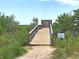 Charming path to Oyster Point community dock, perfect for enjoying waterfront living and scenic views at 2292 Skyler Dr, Mount Pleasant, SC 29466