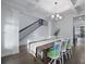 A stylish dining space highlighted by coffered ceiling, hardwood floors and elegant decor at 2292 Skyler Dr, Mount Pleasant, SC 29466