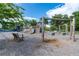 Well-maintained community playground with swings, slide, and wooden structures for outdoor fun at 2292 Skyler Dr, Mount Pleasant, SC 29466