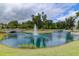 A scenic pond with a fountain and bridge, enhancing the community's natural beauty at 2292 Skyler Dr, Mount Pleasant, SC 29466