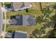 Aerial view of a home with a dark roof, situated on a well-maintained lawn at 234 Daniels Creek Cir, Goose Creek, SC 29445
